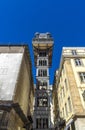 Frontal view from below of the Santa Justa Elevator or Elevador do Carmo. Modernist style metal structure elevator in the center