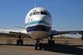 VIEW OF A STATIC BLUE AND WHITE BOEING-707 0N DISPLAY AT THE SOUTH AFRICAN AIR FORCE MOUSEUM