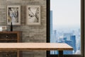 frontal view on empty clean wooden desk workplace minimalist office background with panoramic view on big city skyline digital Royalty Free Stock Photo