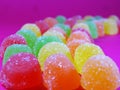 Gummies candy on a ondulated pattern Royalty Free Stock Photo