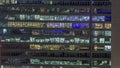 Frontal view of night facade of building with a lot of windows with light timelapse. Royalty Free Stock Photo