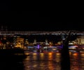 Frontal view from the River Thames of the Millennium Bridge, Blackfriars Bridge and the Tower Bridge at night, with their lights Royalty Free Stock Photo