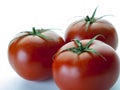 FROntal view of three red tomatoes 2 Royalty Free Stock Photo