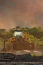 Frontend loader with backdrop of approaching bushfire