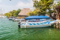 FRONTERAS, GUATEMALA - MARCH 10, 2016: Boats at Rio Dulce river at the pier in Fronteras town, Guatema Royalty Free Stock Photo
