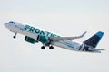 Frontier Airlines flying up in the sky