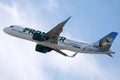 Frontier Airlines flying up in the sky