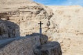 The frontier cross belonging to the monastery of St. George Hosevit Mar Jaris stands on the road leading to the monastery near M