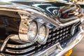 Frontlights and radiator of old Exclusive Luxury Rolls-Royce vintage car ckose-up. Royalty Free Stock Photo