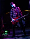 Frontman concept. Man with shouting face holds guitar, Royalty Free Stock Photo