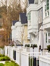 Frontside of brand new residential townhouses. Row of townhouses for sale Royalty Free Stock Photo