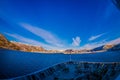 Frontside view from hurtigruten Ship cruise, with a gorgeous coast with buildings in the horizont Royalty Free Stock Photo