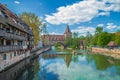 Fronveste bridge through Pegnitz river and Schlayerturm tower from 1422. Nuremberg, Bavaria, Germany Royalty Free Stock Photo