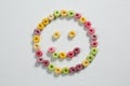 Froot loops forming a smiley face Royalty Free Stock Photo