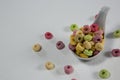 Froot loops in spoon Royalty Free Stock Photo