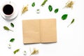 Froral flat lay with cup and notepaper top view mockup Royalty Free Stock Photo
