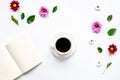 Froral flat lay with cup and notepaper top view mockup Royalty Free Stock Photo