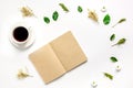 Froral flat lay with cup and notepaper top view mockup Royalty Free Stock Photo