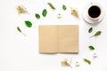 Froral flat lay with cup and notepaper top view mockup Royalty Free Stock Photo