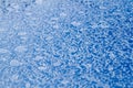 Frost on a blue surface Royalty Free Stock Photo