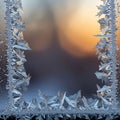 Frost forms intricate patterns on a window, creating a natural frame around a blurred Royalty Free Stock Photo