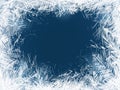 Frost. Frozen window glass in cold freeze weather, christmas decoration. Transparent water crystals ornament on blue Royalty Free Stock Photo