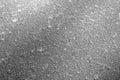 Frost on metal car top with blur effect in black and white. Royalty Free Stock Photo