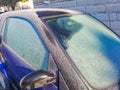 frost in the morning by car,the blue car is covered with hoarfrost in morning Royalty Free Stock Photo