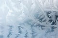 A frost pattern on a windowpane. Ice crystals or cold winter background. Generative AI