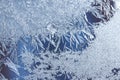 Frost patterns on the window, hoarfrost background. Frosty Christmas pattern on the winter window glass. Copy space, natural Royalty Free Stock Photo