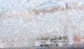 Frost patterns on the window, hoarfrost background. Frosty Christmas pattern on the winter window glass. Copy space, natural Royalty Free Stock Photo
