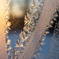 Frost patterns on a window, illuminated Royalty Free Stock Photo