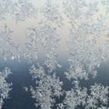 Frost patterns on windowpane at winter dawn Royalty Free Stock Photo