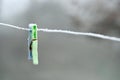Frost on plastic clothes peg left on a washing line Royalty Free Stock Photo