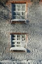 Frost and rime ice covered windows and brick wall Royalty Free Stock Photo