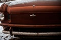 Frost on a rusty car bumper