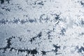 Frost on the window, natural pattern. Frozen particles on a window glass. Different ice crystals texture background Royalty Free Stock Photo