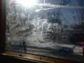 Frost on Window Pane with Sunlight Shining