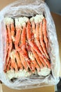 frosted Alaska king crab closeup photo on white table background Royalty Free Stock Photo