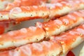 frosted Alaska king crab legs closeup photo on white table background Royalty Free Stock Photo