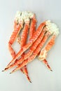 frosted Alaska king crab legs closeup photo on white table background Royalty Free Stock Photo