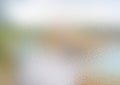 Frosted colored glass. Frosty natural background. Corrugated glass texture with blurred spots Royalty Free Stock Photo