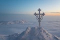 Frosted cross against charming nature