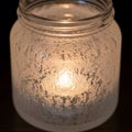 Surface of the jar diffuses the light, offering a soft, ambient Royalty Free Stock Photo