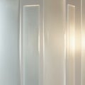 Frosted glass with a translucent appearance, diffusing light for privacy. The surface texture is smooth Royalty Free Stock Photo