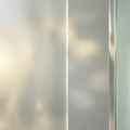 Frosted glass with a translucent appearance, diffusing light for privacy. The surface texture is smooth Royalty Free Stock Photo