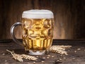 Frosted mug of beer on the wooden table. Royalty Free Stock Photo