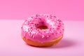 Frosted Pink donut isolated. Generate Ai