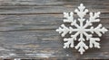 Frosted Snowflake Pattern on Rustic Wooden Background