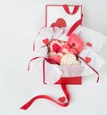 Frosted Valentine Cookies in Tissue and Red Satin Gift Box Royalty Free Stock Photo